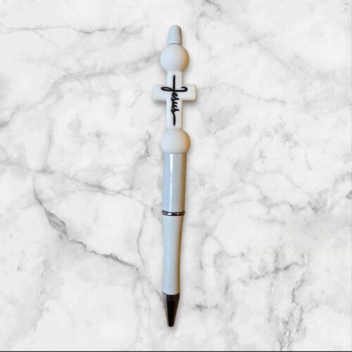 witte pen met wit kruisje